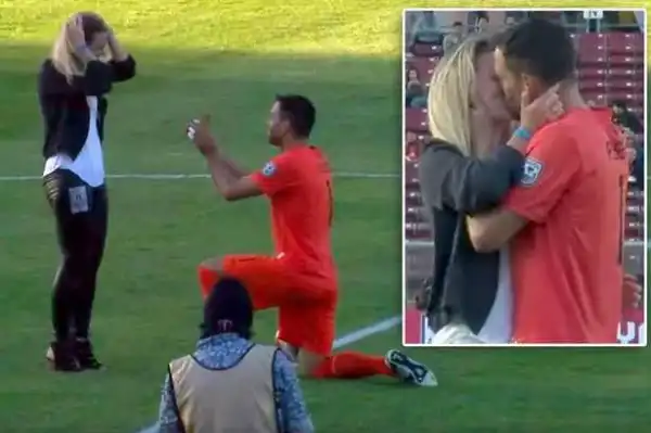 Photos: Goalkeeper Proposes To His Girlfriend On Halfway Line - She Says YES...